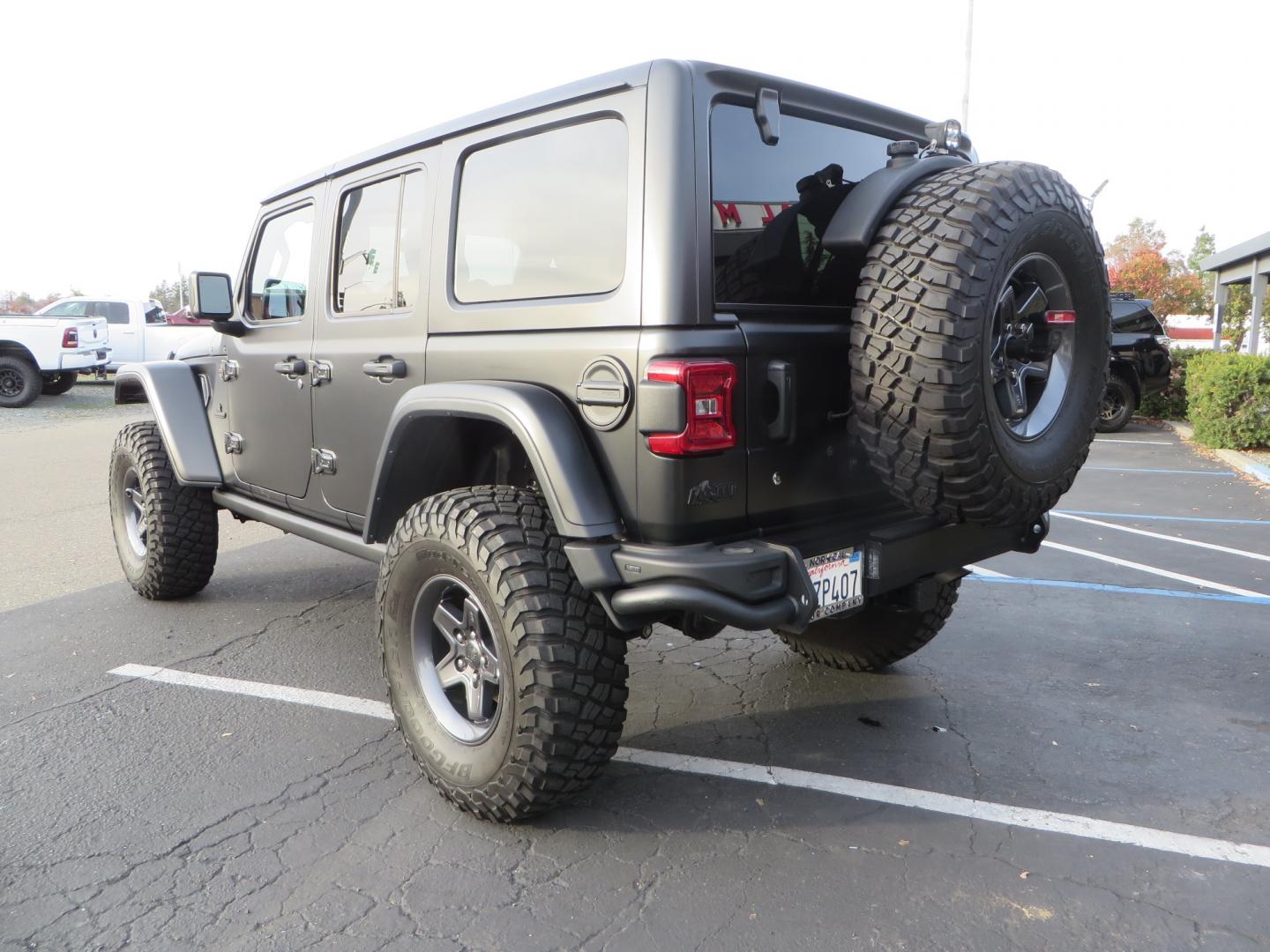 2020 BLACK /BLACK Jeep Wrangler Unlimited Rubicon (1C4HJXFGXLW) with an 3.6L V6 DOHC 24V FFV engine, 6A transmission, located at 2630 Grass Valley Highway, Auburn, CA, 95603, (530) 508-5100, 38.937893, -121.095482 - STANDARD CONTENT AEV RX Front Bumper AEV Front Skid Plate AEV Non-Winch Cover Plate AEV 7000 Series Lights AEV Light Cover Kit AEV 2.5" DualSport RT Suspension System AEV Front Geometry Correction Brackets AEV Steering Stabilizer AEV Rear Bumper AEV Swing-Out Tire Carrier AEV CHMSL Mount - Photo#6